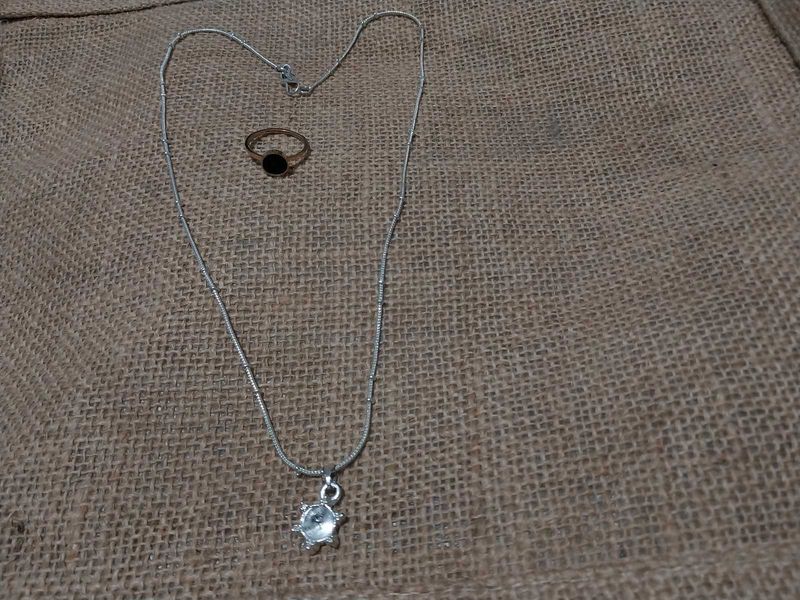 silver color pendant chain and rose gold chai