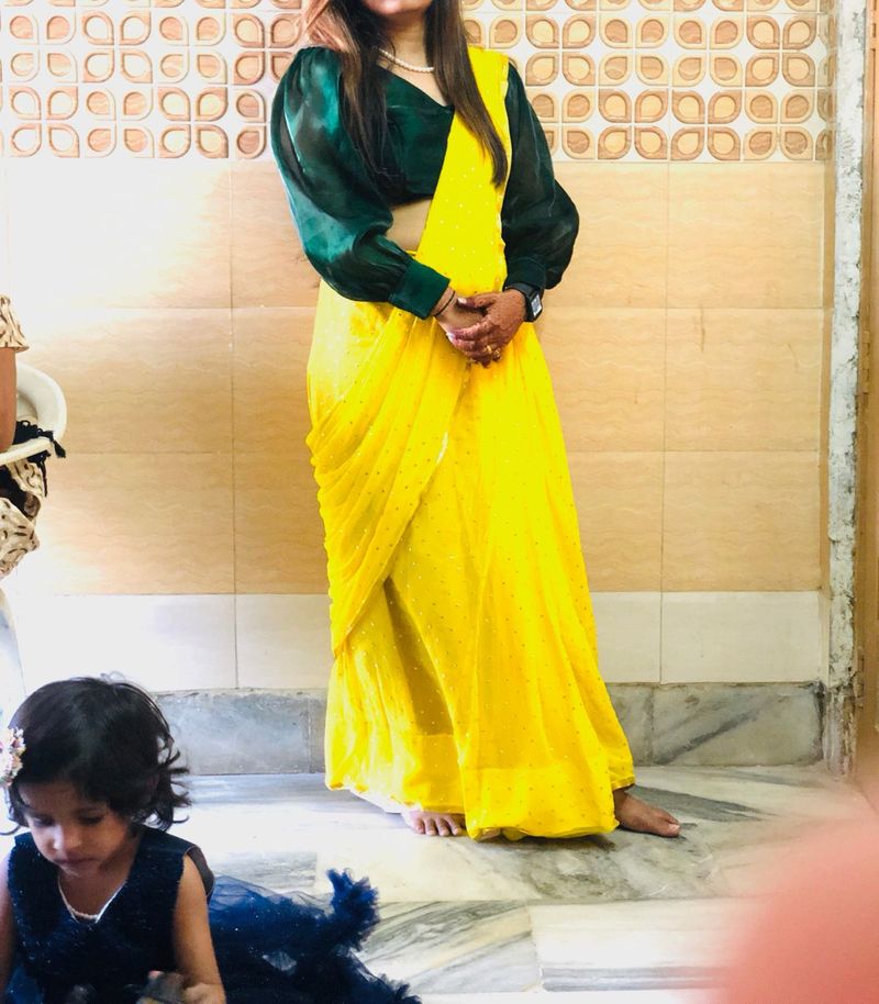 yellow saree with green blouse