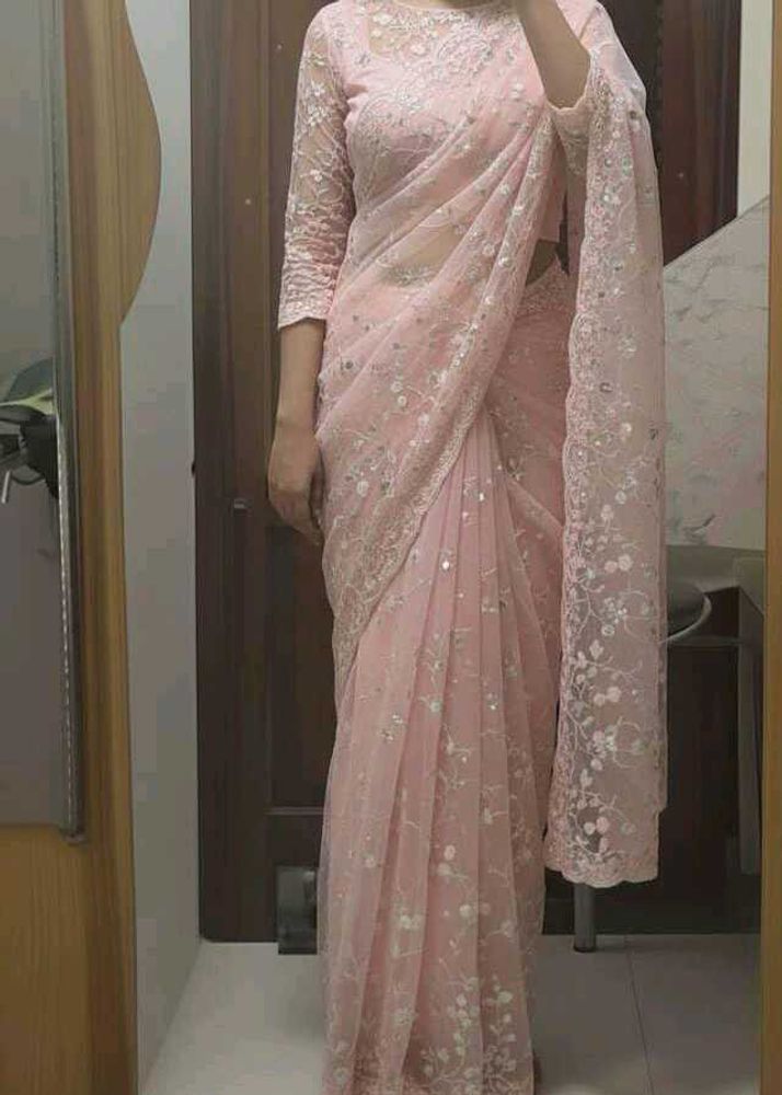 each 700Elegant Pink Embroidered Saree