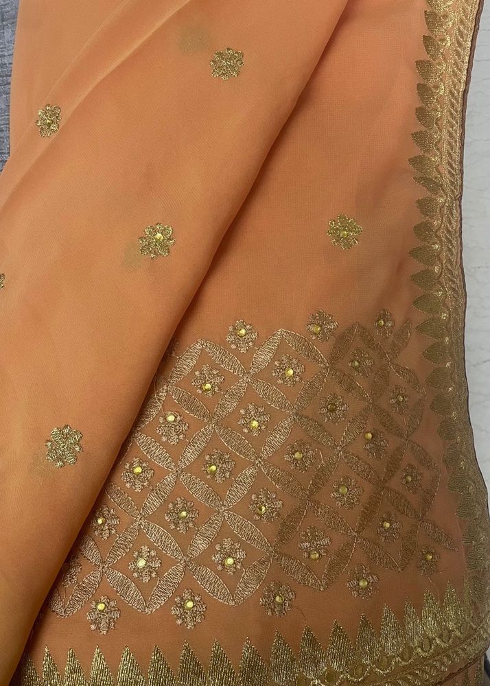 Georgette saree with golden embroidery &amp; blouse