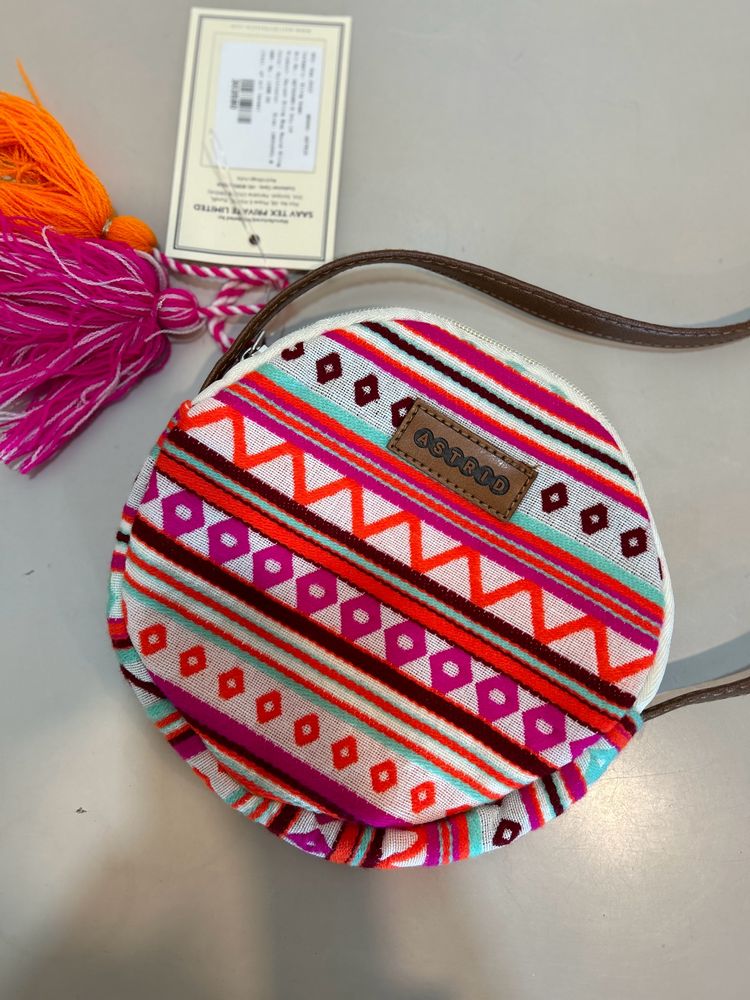 Astrid round Geometric print sling bag for women
