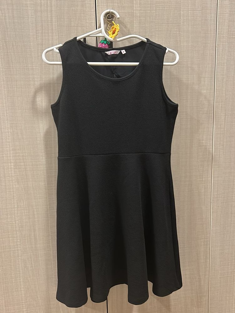 Black Flared Dress With Triangle Back Cutout
