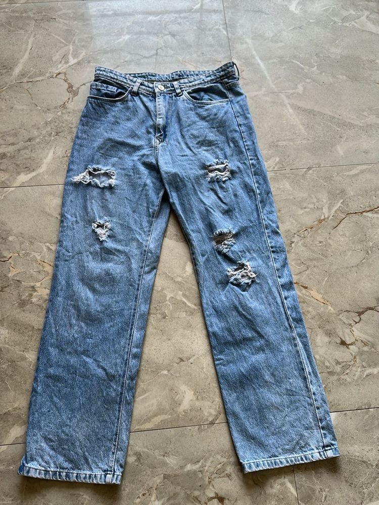 Ripped Blue Denim Jeans