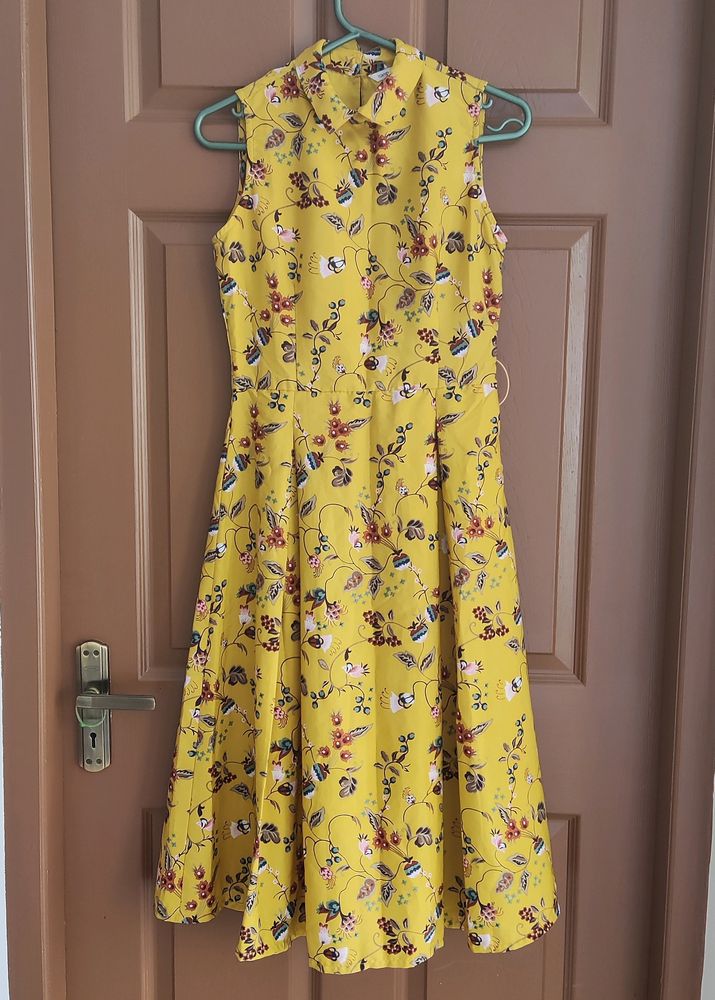Yellow Printed Flair Dress - Used Only Once