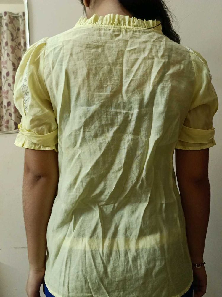 women yellow top