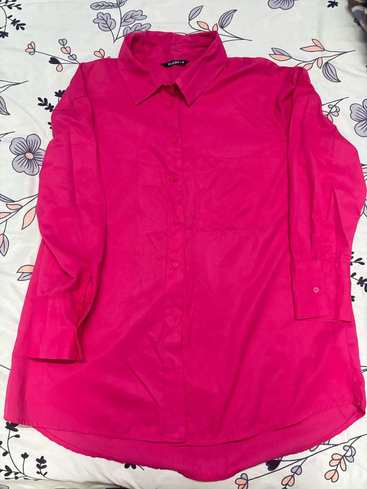 oversized pink shirt.