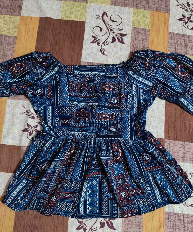 Patterned Peplum Top