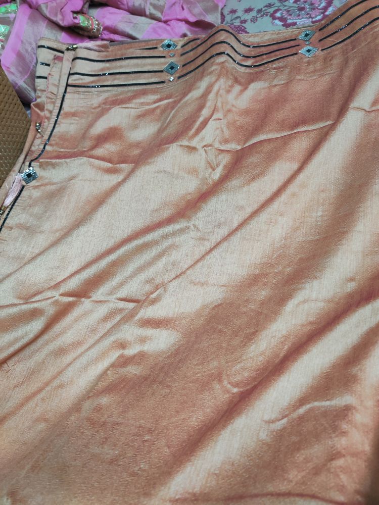 rust orange colour saree with black border