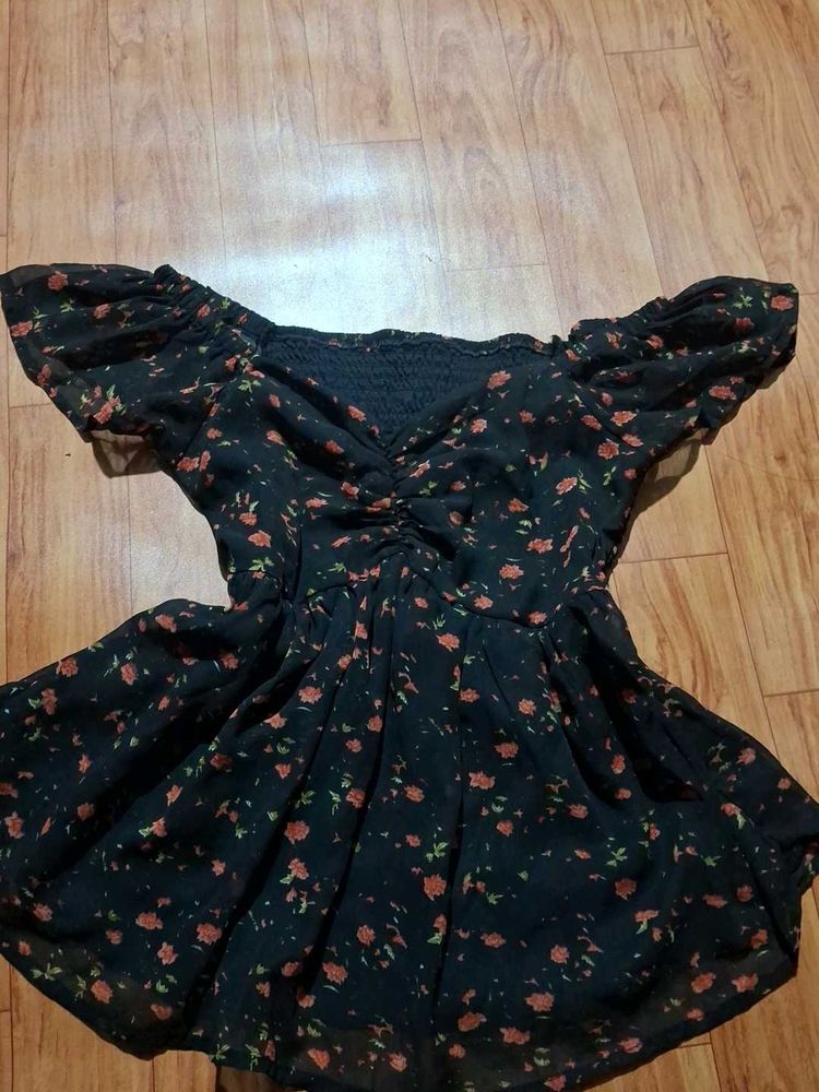 black ruffle top