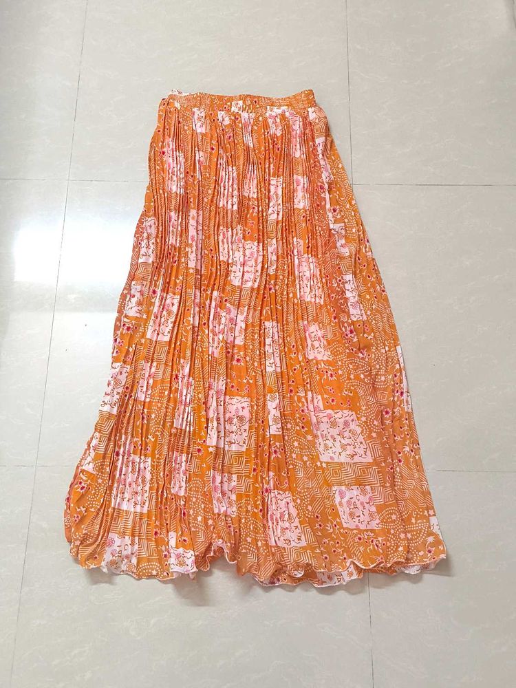 Pleated Orange Skirt