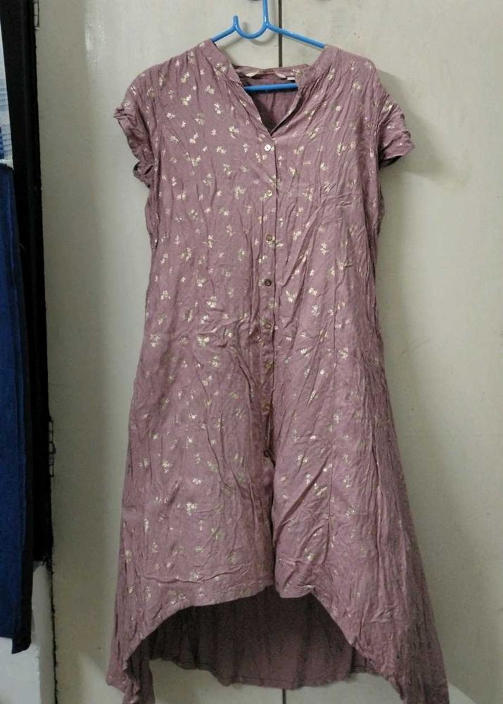 A beautiful peach pinkish kurti