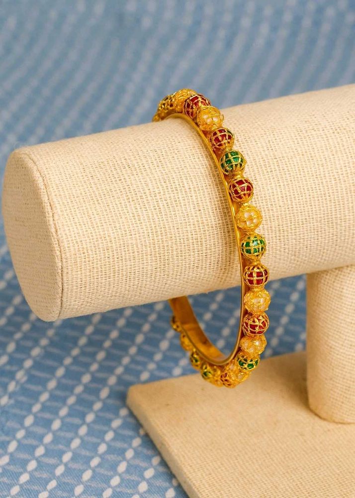 Elegant Gold Bangle with Colorful Bead Accents