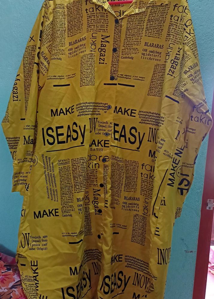 Newspaper Print Shirt Style Yellow Colour Kurti.