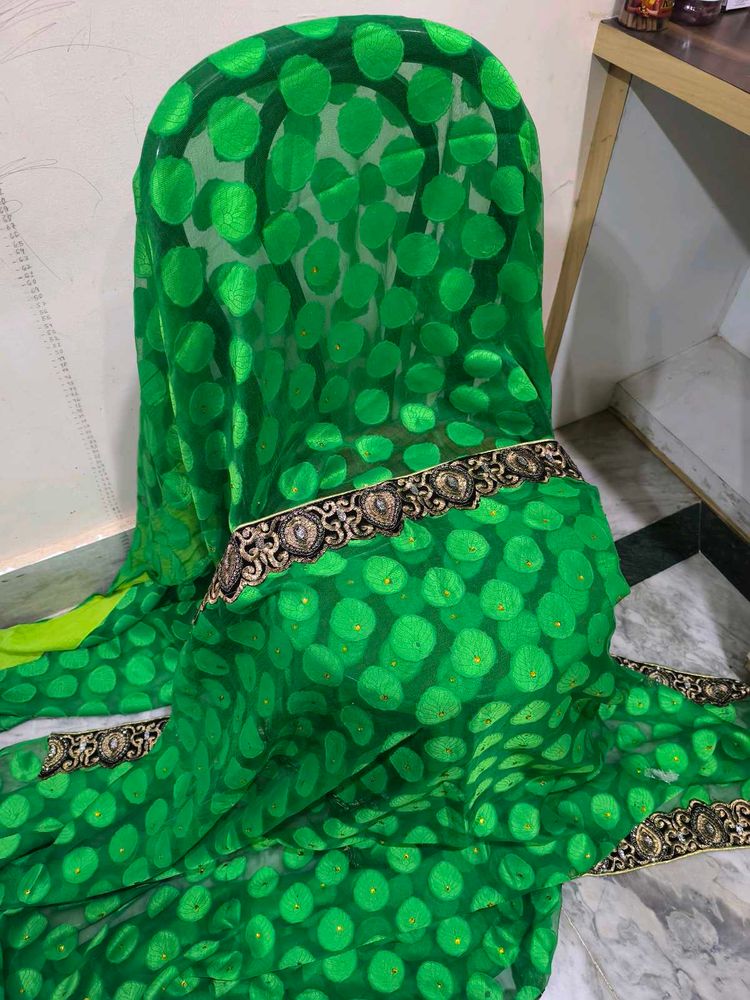 Green Leaf Saree With Yellow Stones.