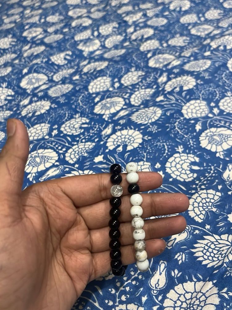 pair of two batcelets black and white