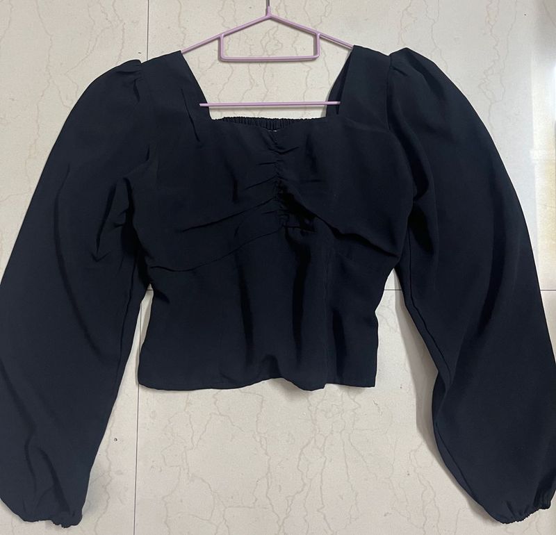 Black full sleeve peplum top