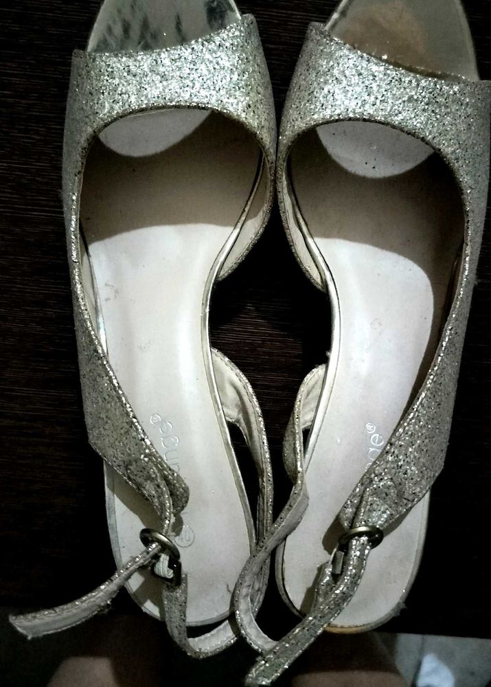 New sparkly gold stilettos.