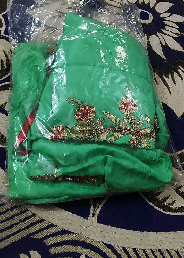 Green  unstitched suit salwar with pure dupatta