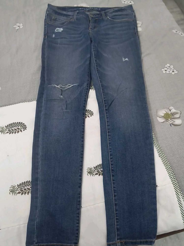 Distressed Denim Jeans