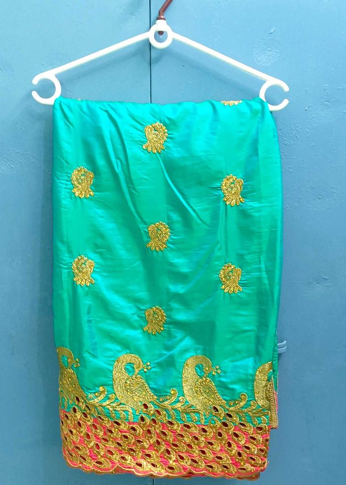 Elegant Turquoise Embroidered Saree