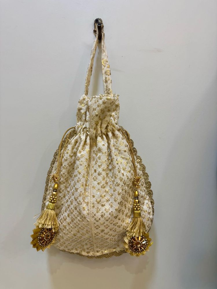 Royal Golden Potli With Tassels