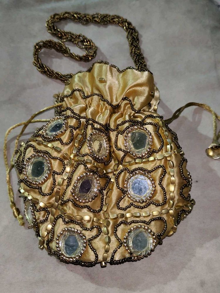 Golden Clutch With Mirror Work