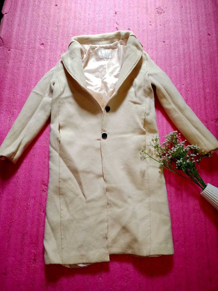 beige colour overcoat