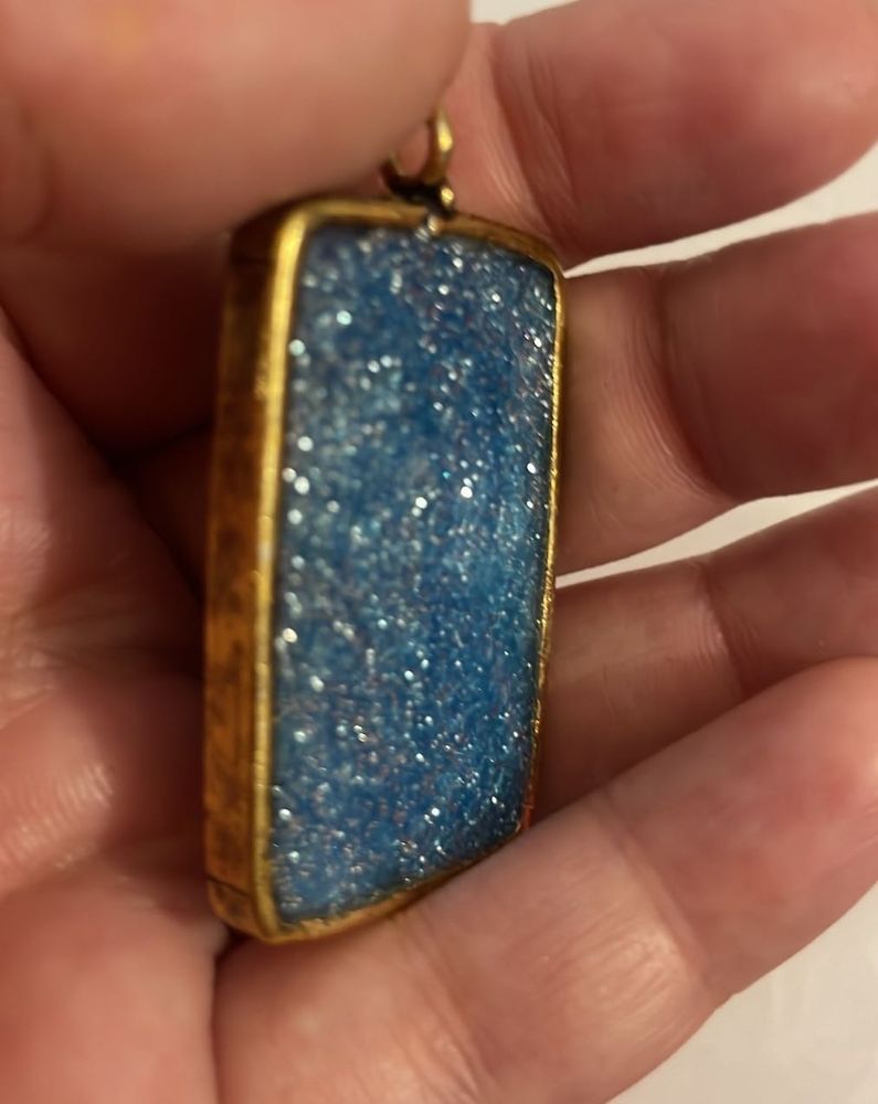 Sparkly blue resin pendant
