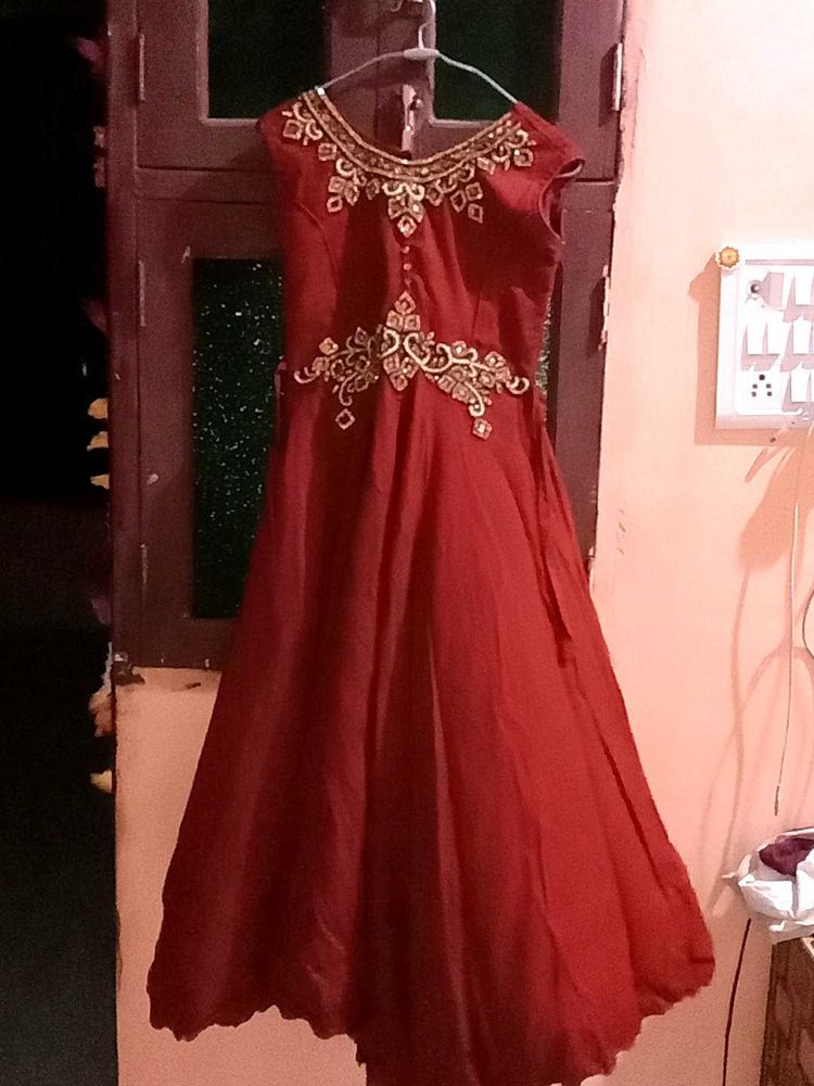 Elegant Maroon Gown with Gold Embroidery