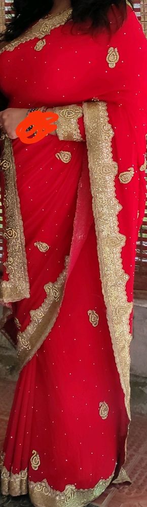 Shiffon bright red partywear saree, golden stone