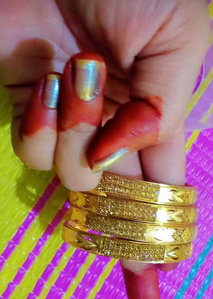 Set of Gold Bangle Bracelets