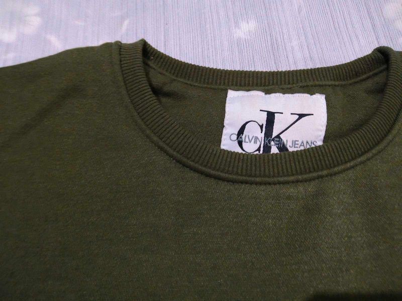 olive green sweatshirt