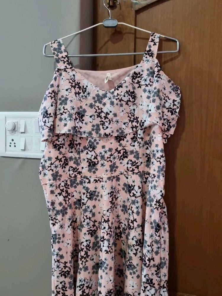 peach and black colored evening gown