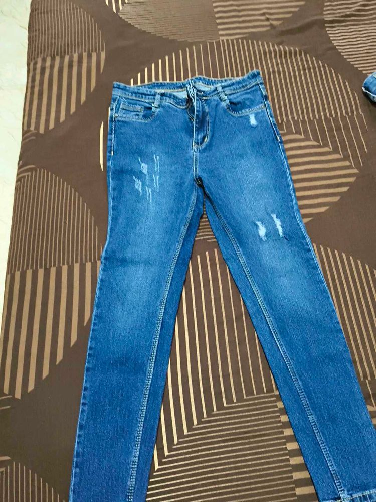 Distressed Denim Jeans