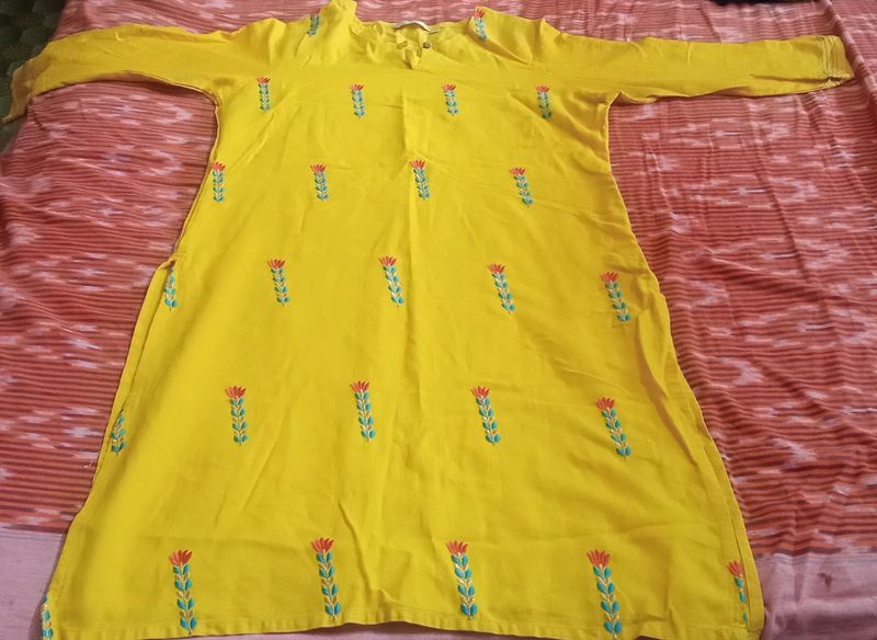 Yellow Colour Top With Nice Flower Design