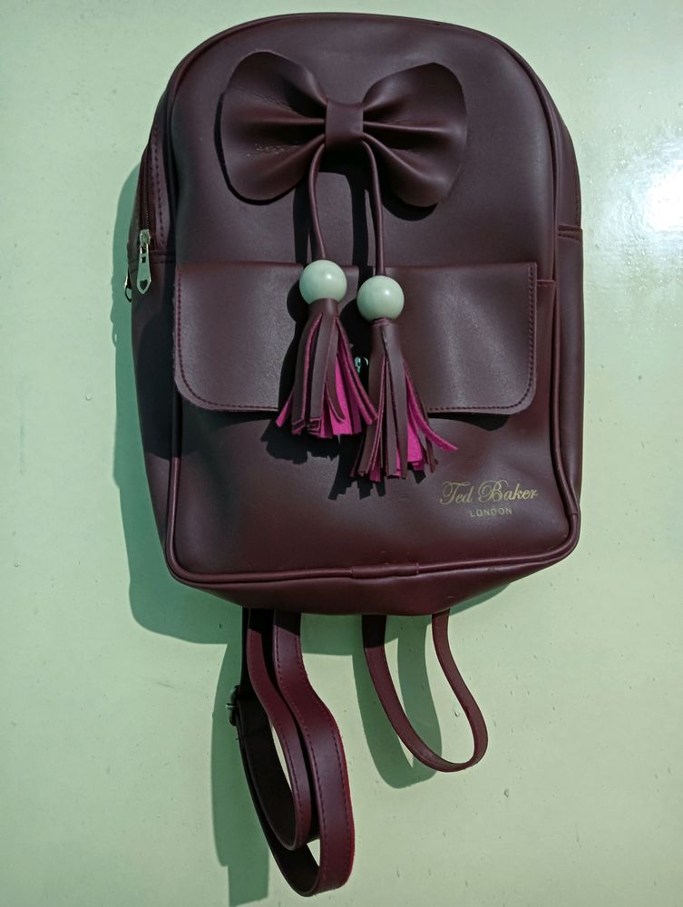 Meroon Ribbon Backpack