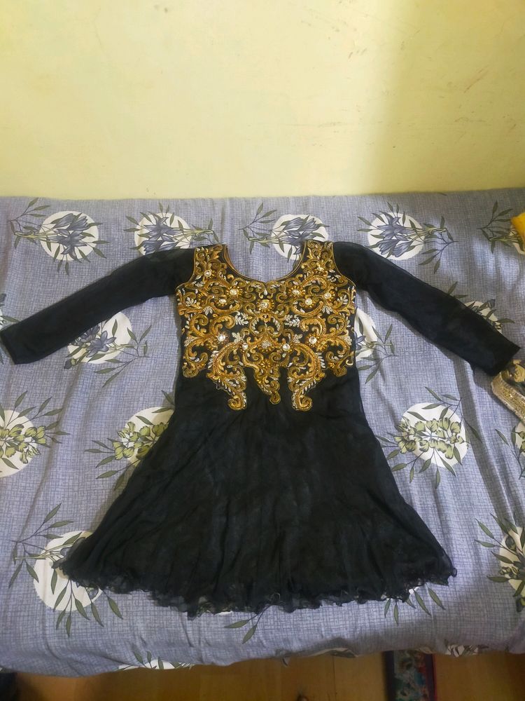 Short Frock With Heavy Embroidery On Neck