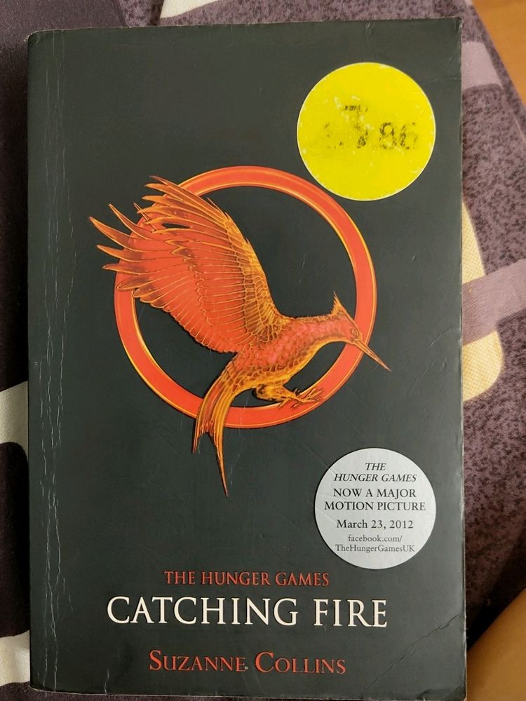 Catching Fire By Suzanne Collins