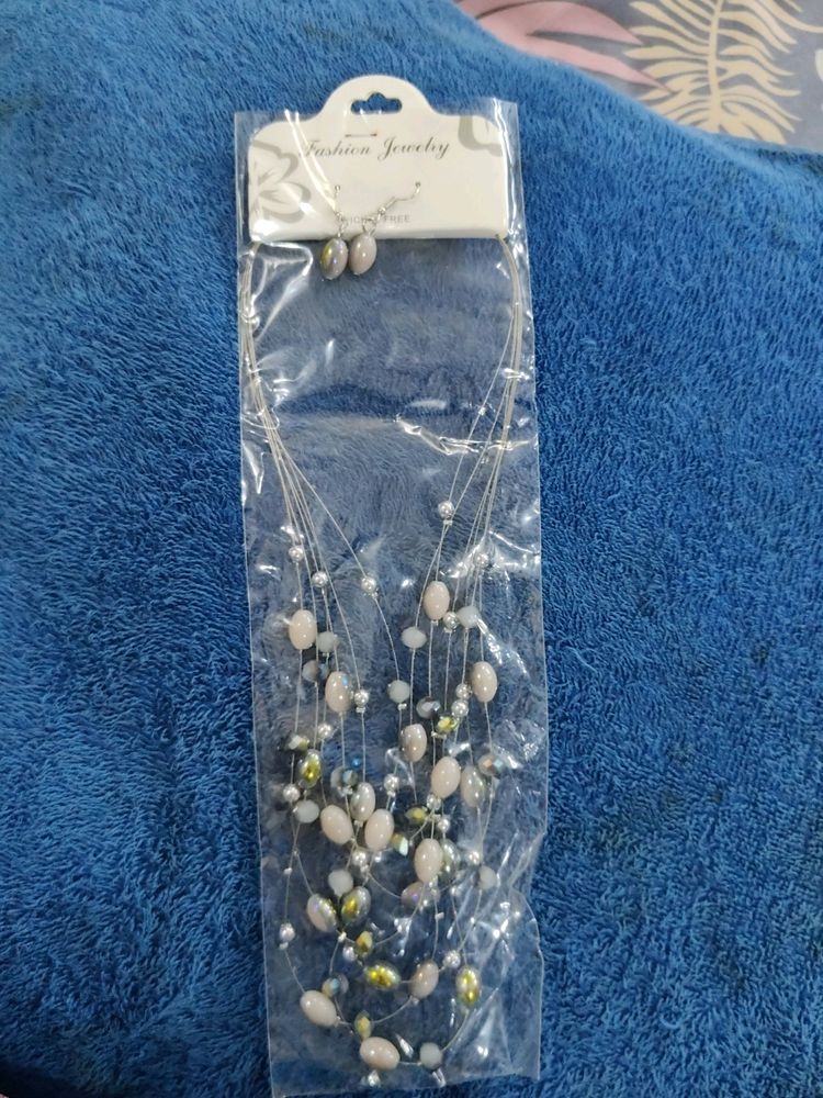 A Fancy Neckpiece With Ear Rings