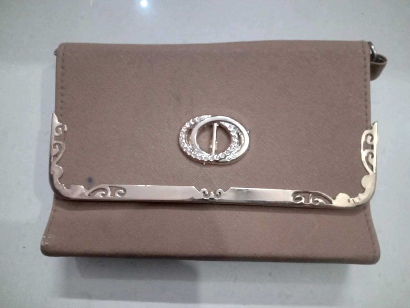 A brown clutch