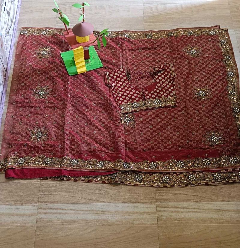 Cute heavy Saree with fancy blouse