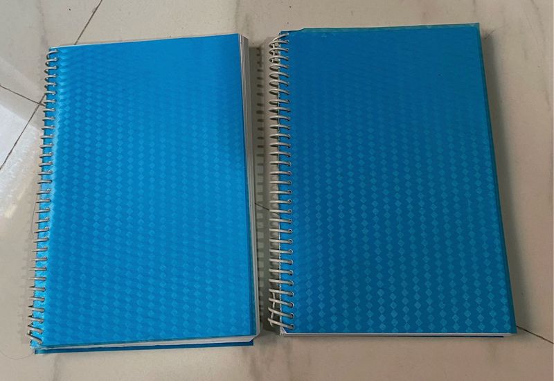 Two Blue Spiral Notebooks