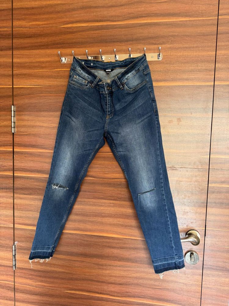 Distressed Denim Jeans