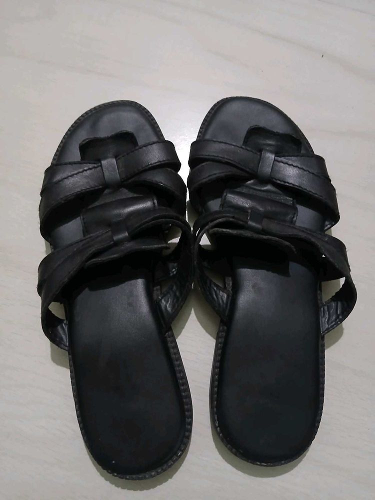 Black leather slides