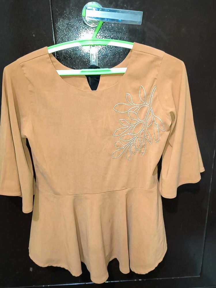 Elegant Tan Peplum Top