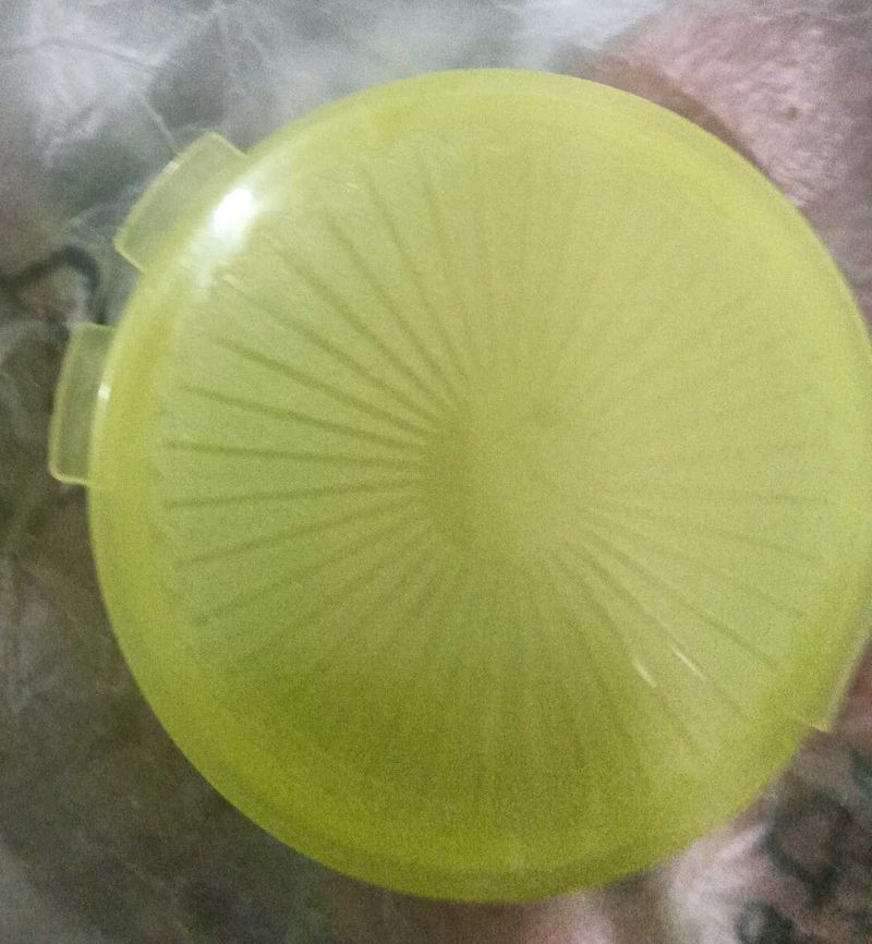 Tupperware pill keeper