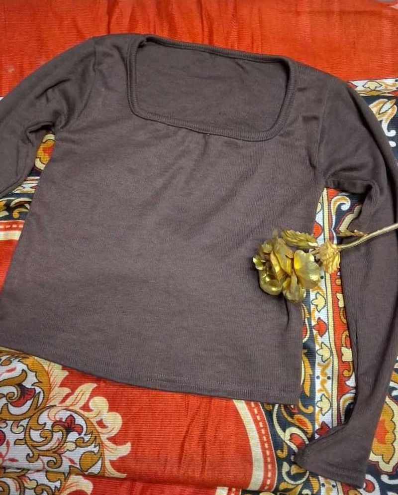 solid brown long-sleeved top