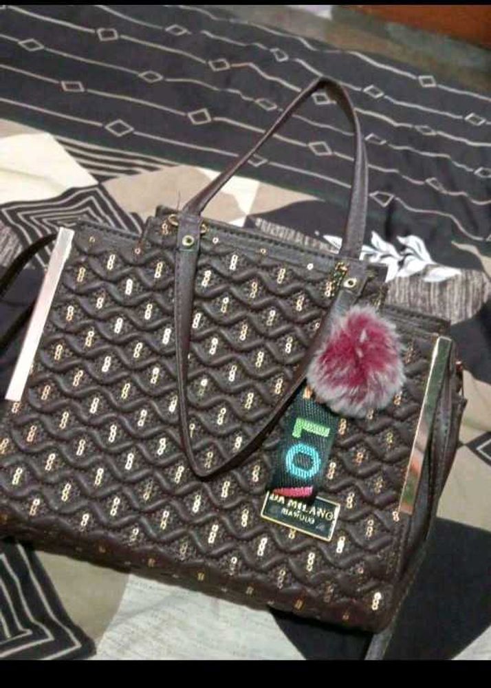 Brown Quilted Handbag with Sequins and Pom-Pom Cha