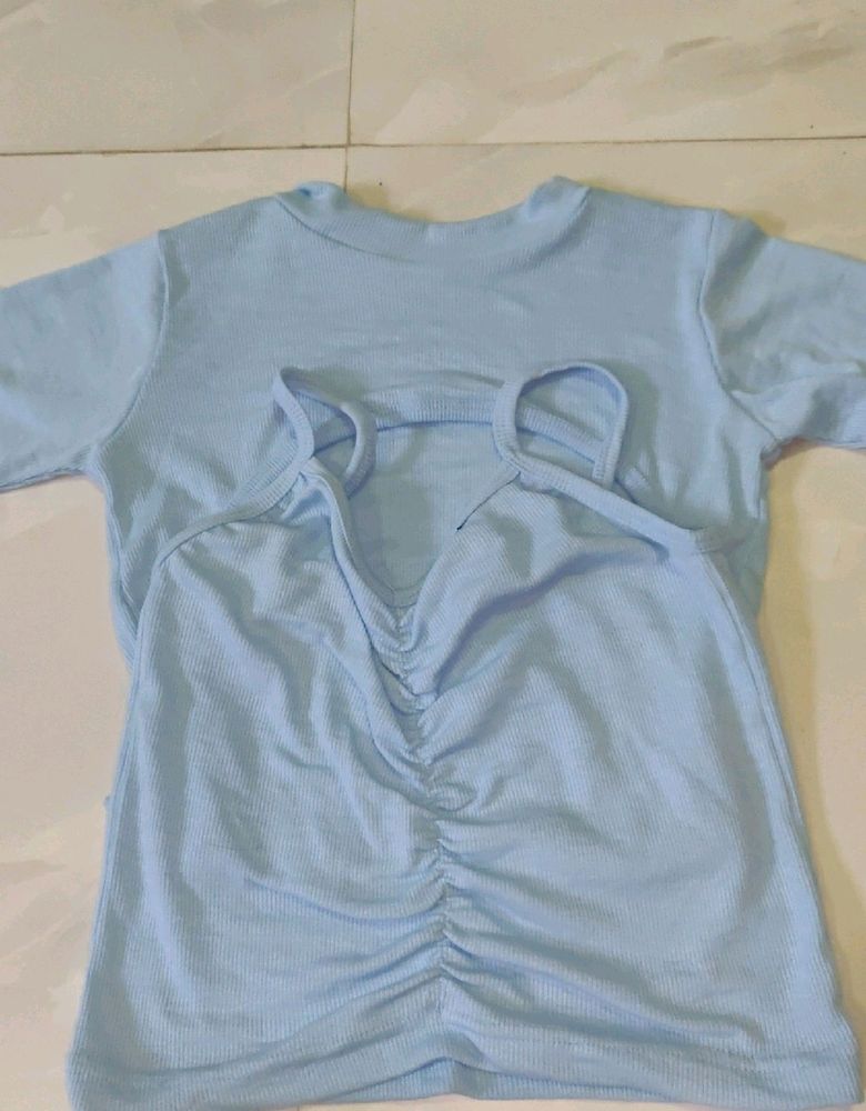 A Blue Crop Top With Crochet