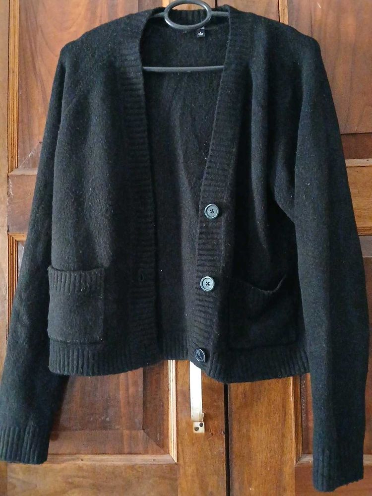 Black Knit Cardigan And Red Sweater